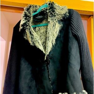 Suede With Sweater Sleeve Jacket. Lined With Soft Fur.